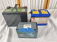 Interstate battery, Yuasa battery, boxed charger together