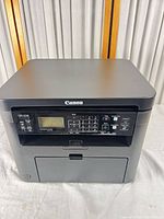 Front view of Canon imageCLASS D570 printer showing control panel and exterior