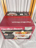 Box front showing Hamilton Beach MealMaker 5.5-qt oval slow cooker image and branding