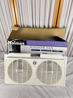 Fan and box front view showing overall condition