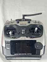 Front of RadioLink AT9 transmitter showing controls and screen
