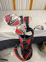 Bag with clubs and headcovers visible