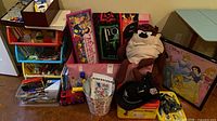 Overall lot with organizer, puzzles, lunchbox, hats, toys
