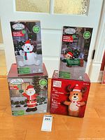 Group shot of four boxed inflatables