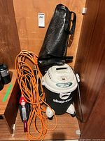 Shop-Vac vacuum with extension cords and utility bag