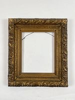 Full view of ornate gilt frame front