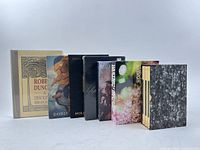 Front angled view showing all seven slip-cased books