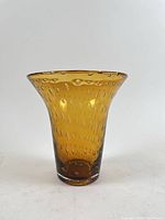 Full view front of amber controlled bubble glass vase