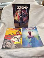Front covers of three Doctor Zero issues displayed upright and flat