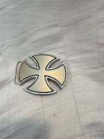 Front view of brushed silver Iron Cross belt buckle
