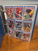 Page of 1991 Score cards showing nine players in blue-border design