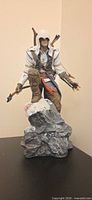 Full view of Connor Kenway figurine on base