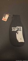 Front view showing Scarface logo and silhouette on bottle cooler