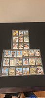 Three binder pages containing 27 1971 Topps baseball cards