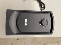 Top/front view showing Dell logo and control knob