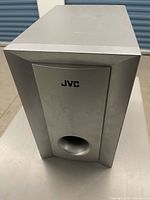 Front view of JVC SP-WA5 showing port and logo