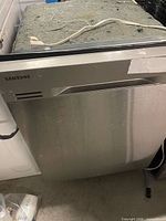 Front view of Samsung stainless dishwasher with control panel and stainless door