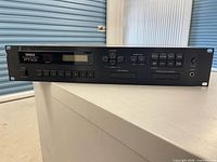 Front view of Yamaha PTX8 showing controls, displays, cartridge slots