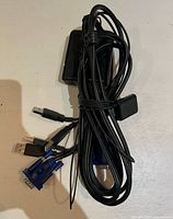 Switch body showing VGA and USB female ports with attached cable bundle