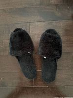 Top view of both slippers showing faux fur uppers