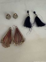 All three pairs of earrings laid out for overview