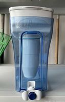 Front view of ZeroWater dispenser showing spigot and filter cartridge