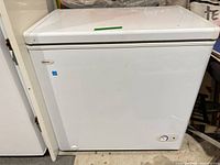 Front view of Danby white chest freezer with lid closed