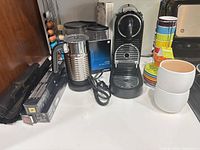 Overall view: Citiz machine, Aeroccino frother, capsule boxes, stacking cups