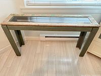 Full view of wood and glass console table