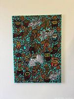 Frontal view of entire painting mounted on wall