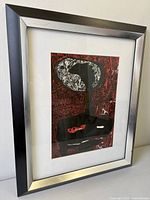 Full view of framed artwork with mat and frame