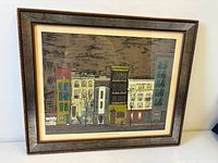 Front view of framed silkscreen showing full artwork and frame