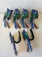 All six stained glass parrot tiebacks front view