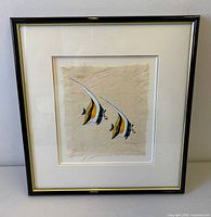 Front view showing framed angelfish print and matting