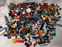 Wide view of mixed LEGO bricks pile