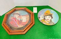 Front view of both plates, showing framed "Jimmy" and unframed "Judy"