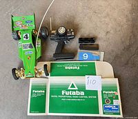 Overall lot with buggy, transmitter, accessories, paperwork