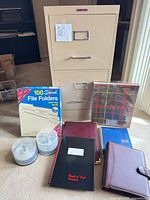 Group view of filing cabinet with all supplies