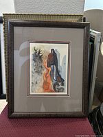 Front view of framed Dali woodcut print