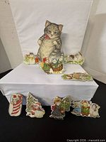Full set of ornaments displayed with gift box