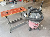 Workbench and shop vac side by side