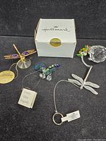 Group shot of all five dragonfly items and Hallmark box