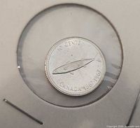 1967 silver dime reverse showing mackerel, denomination and dates