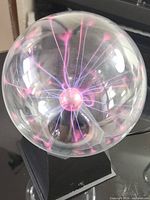 Plasma ball lit showing plasma filaments