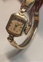 Front view showing dial, case, bracelet attachments