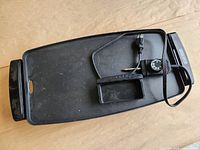 Top view of griddle showing surface, handles and probe