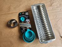 All items: loaf pan, sealed measuring set, cookie cutters