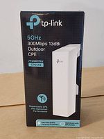 Front of sealed TP-Link CPE510 box showing branding and key specs