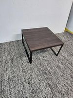 Full view of square accent table showing overall design