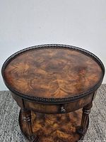 Top view showing birds eye maple veneer and metal gallery edge